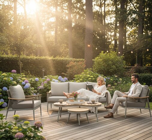 SenS-Line Sevilla loungeset met ovale en ronde tafel en beige Olefin kussens.